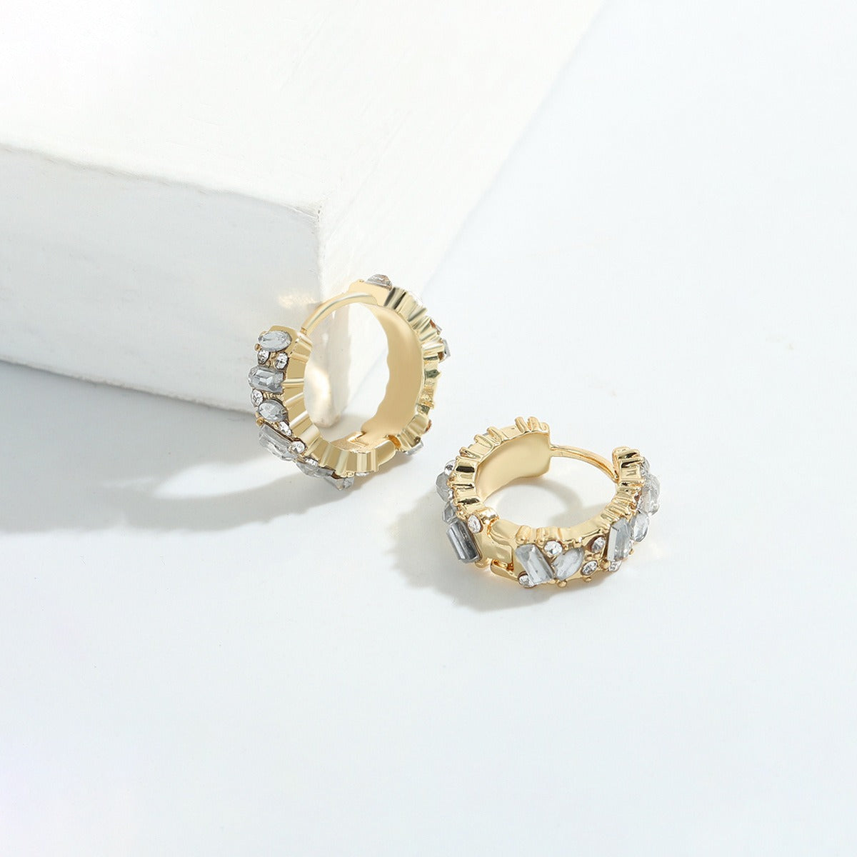 European and American style female copper earrings embedded with colored gemstones, geometric circles, electroplated gold earrings, fashionable and trendy style