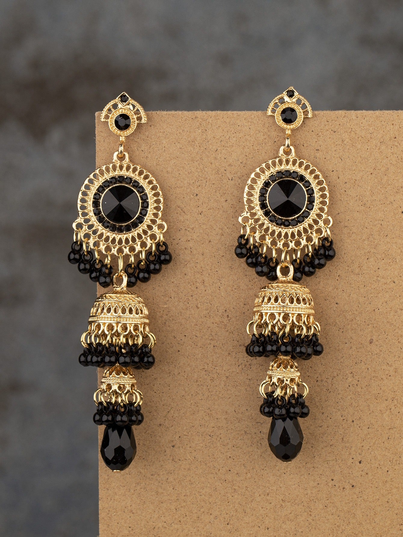 Fashionable and personalized micro diamond earrings Thai retro women's long luxurious imitation large gemstone bell tassel earrings