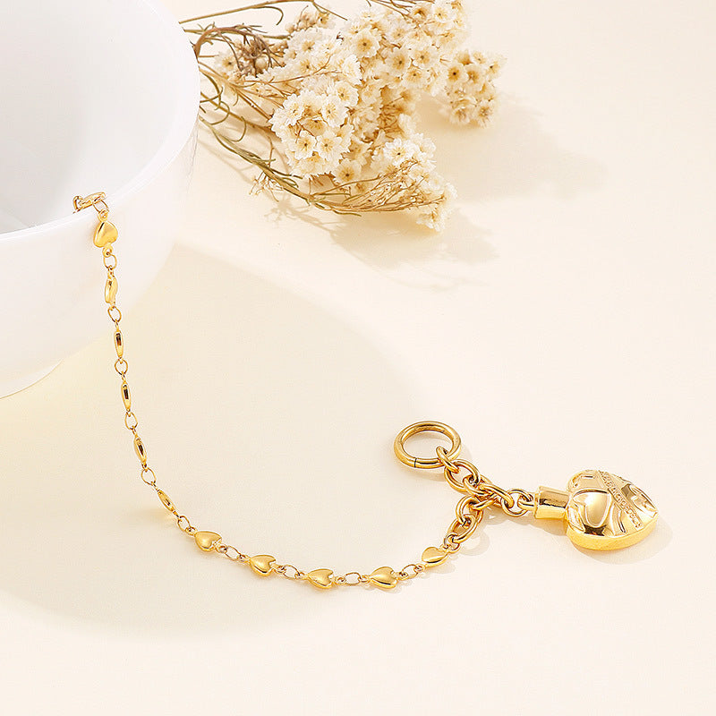 Temperament Fashion Ladies Stainless Steel Heart T-Button Bracelet Necklace Set