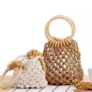 The new solid color net bag hand woven bag forest hand tied cotton thread hand carry seaside holiday beach bag