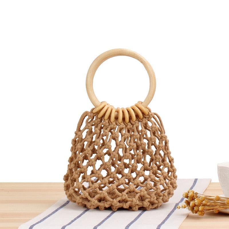 The new solid color net bag hand woven bag forest hand tied cotton thread hand carry seaside holiday beach bag