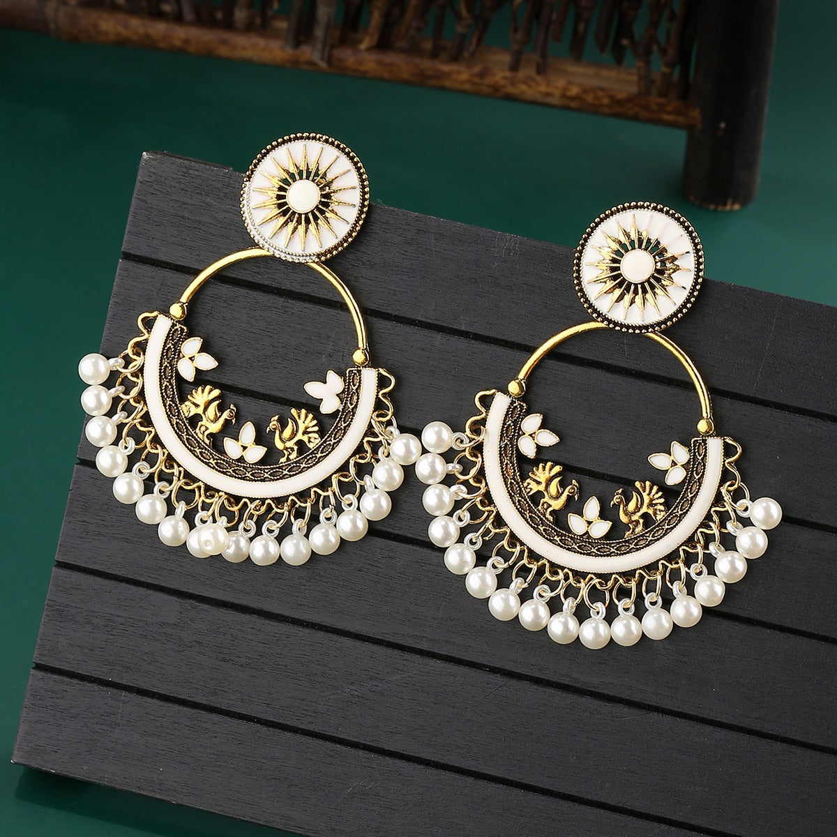 Moon alloy earrings jewelry exaggerated retro Indian style hollowed out bell pendant design sense earrings jewelry